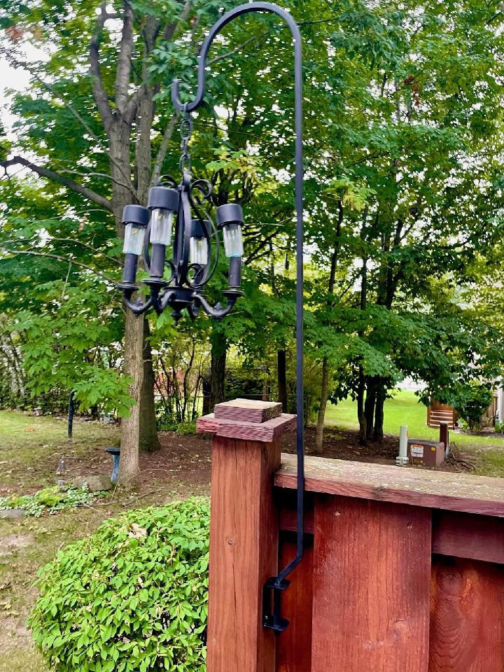 Lawn hook with hanging lantern on deck